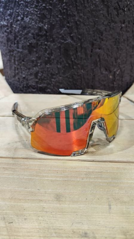 Lentes 100% montura transparente letras plateadas cristal ligeramente rojo