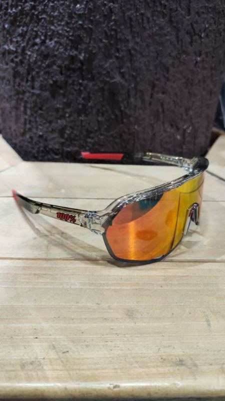 Lentes 100% montura transparente letras rojas y cristal polarizado rojo