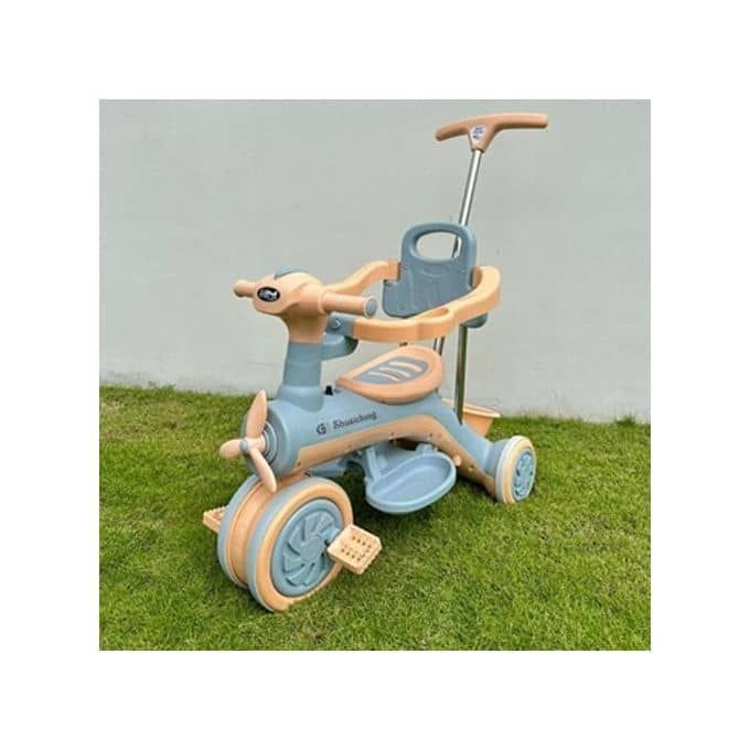 Tricycle enfant
avec poussette ( jusqu'a 4ans )
.Musique intégrée