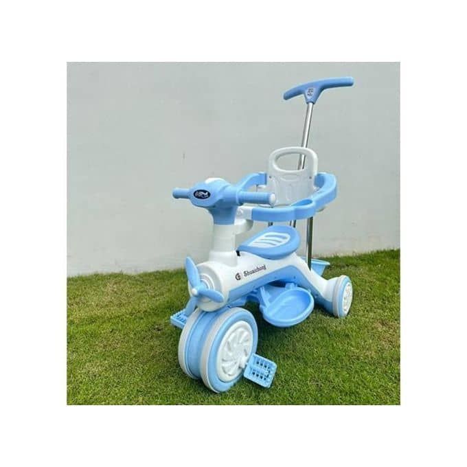 Tricycle enfant
avec poussette ( jusqu'a 4ans )
.Musique intégrée