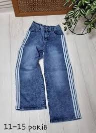 Un jean large
TOP FEMME