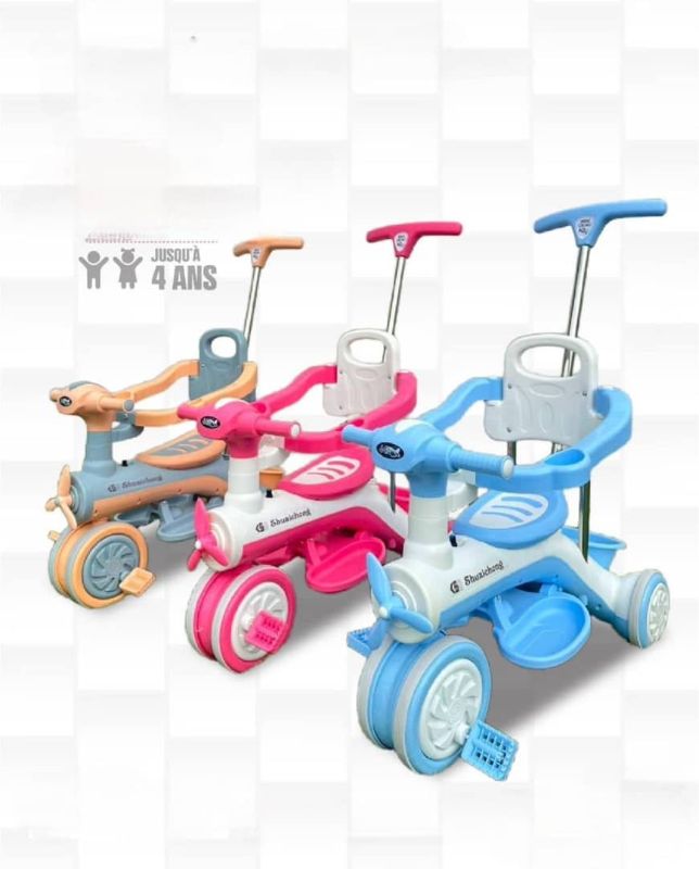 Tricycle enfant
avec poussette ( jusqu'a 4ans )
.Musique intégrée