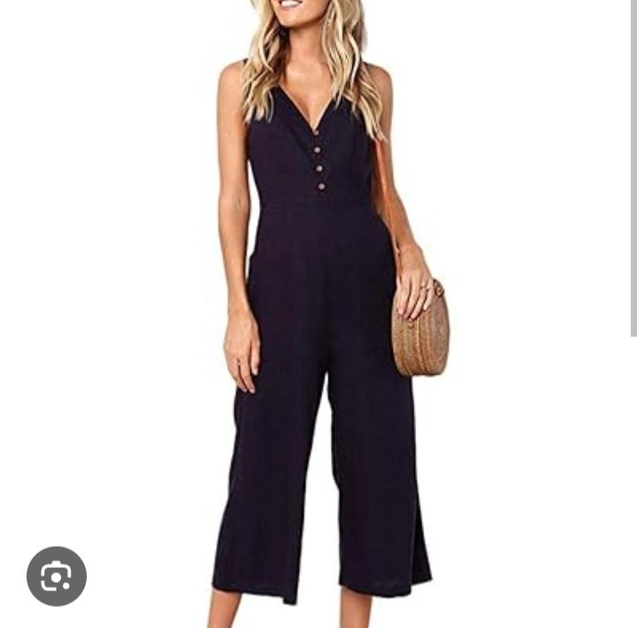 Combinaison pantalon noir sans manche avec un noeud au dos