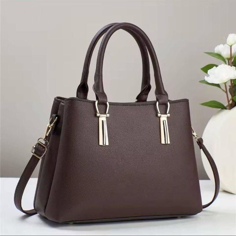 ✨ High Quality Handbag  
With Long Adjustable Belt👜