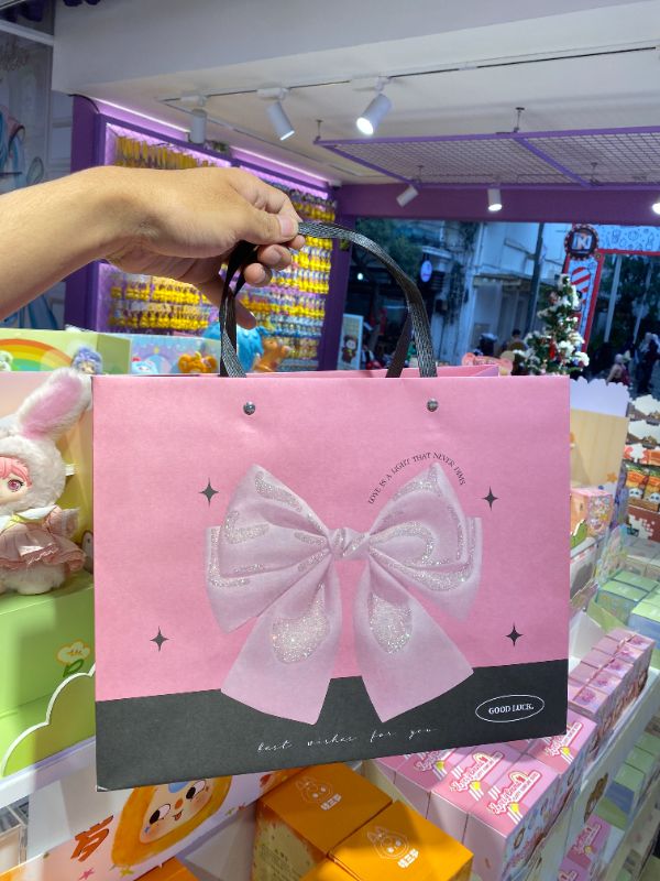 Kantong horizontal alas lebar M