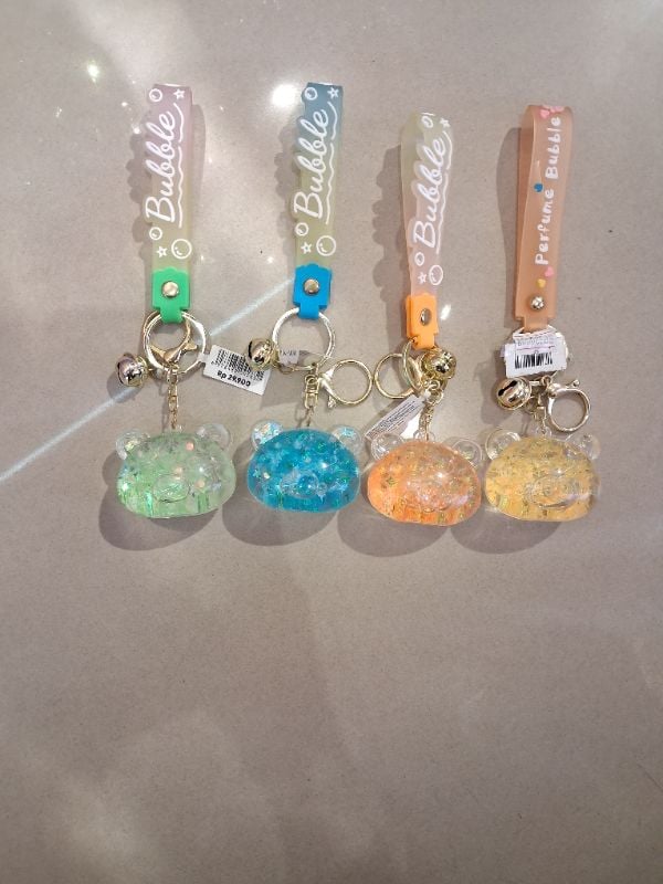 Gantungan kunci model kepala beruang