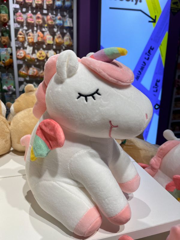 Boneka plush unicorn-putih