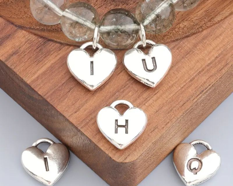 tinny heart with letter