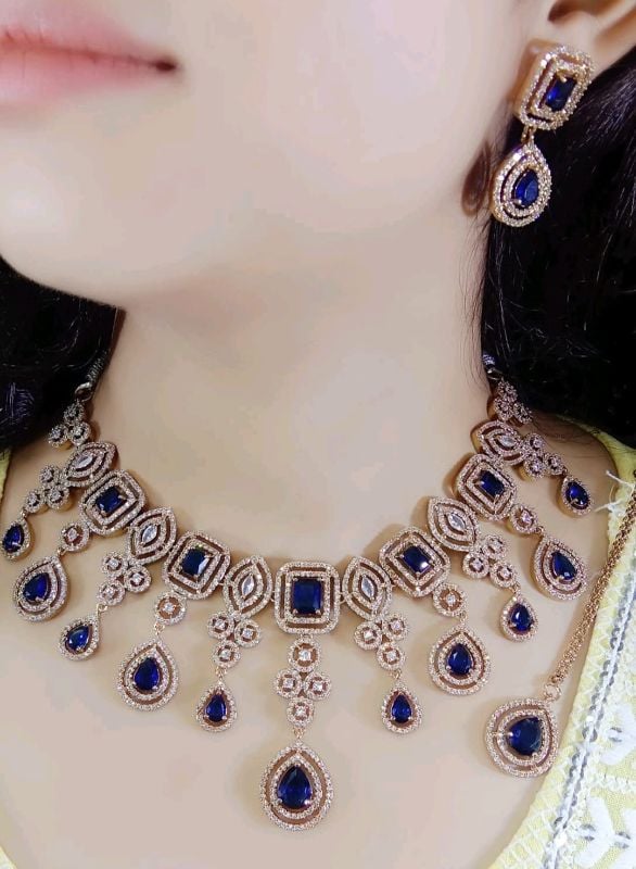 Rhodium-Plated American Diamond Studded Teardrop Tasselled Mehndi ploish Necklace With Earrings Jewellery Set For Girls and Women
-AD003