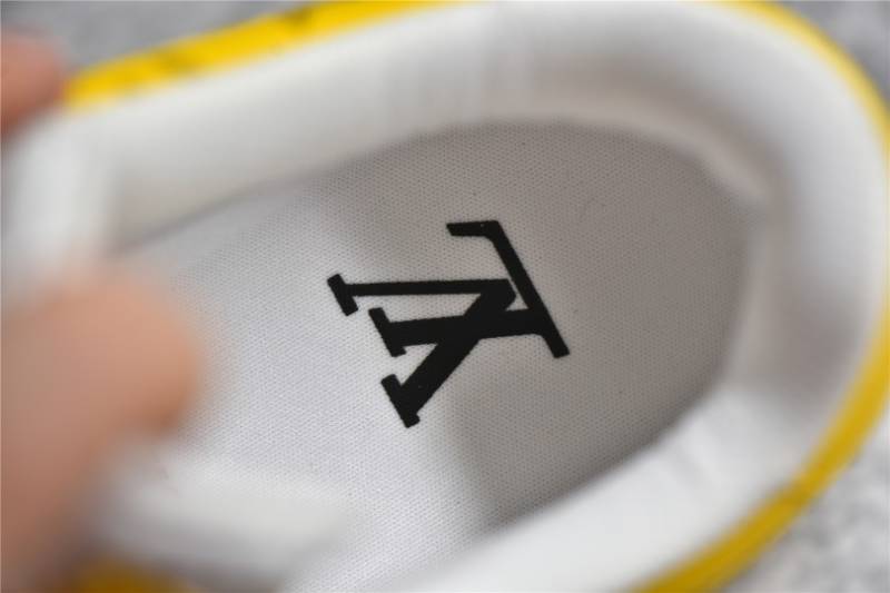Louis Vuitton Nike Air Force 1 Low
By Virgil Abloh Yellowl