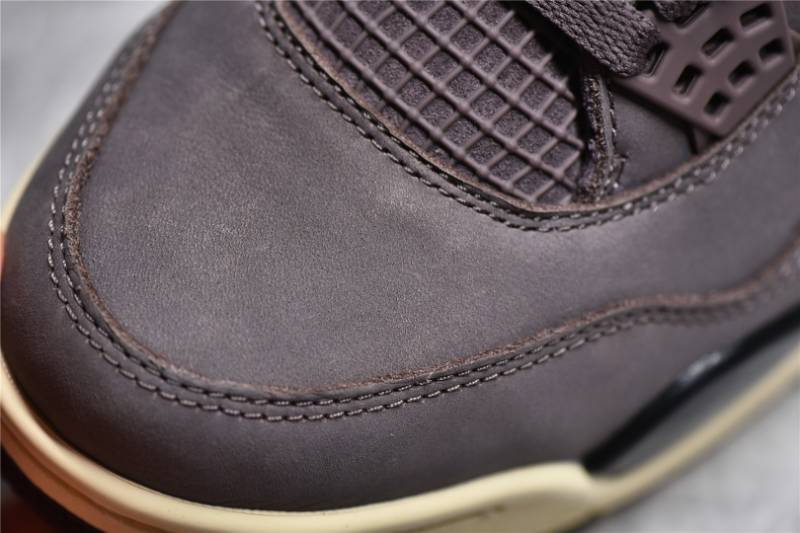 Jordan 4 Retro
A Ma Maniére Violet Ore