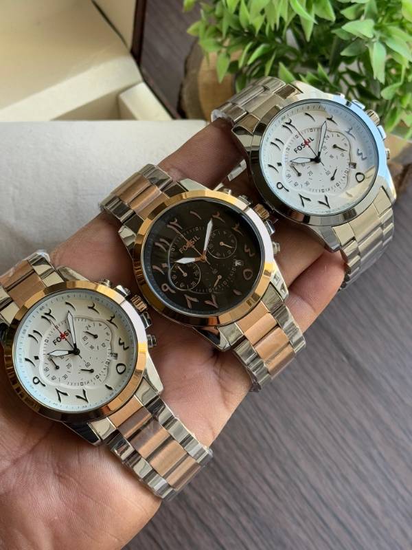 This Fossil watch exudes elegance with its sleek stainless steel design, unique Arabic numeral styling, and sophisticated chronograph functionality.