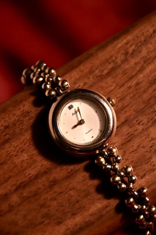 Alba Two-Toned Beaded Bracelet Watch With Blue Jewel