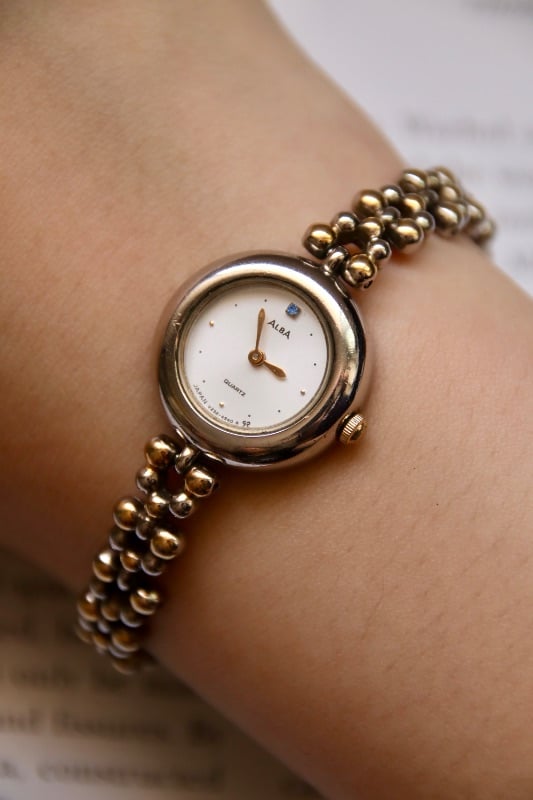 Alba Two-Toned Beaded Bracelet Watch With Blue Jewel